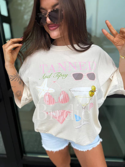 Tanned and Tipsy (Pink) Graphic Tee on Ivory